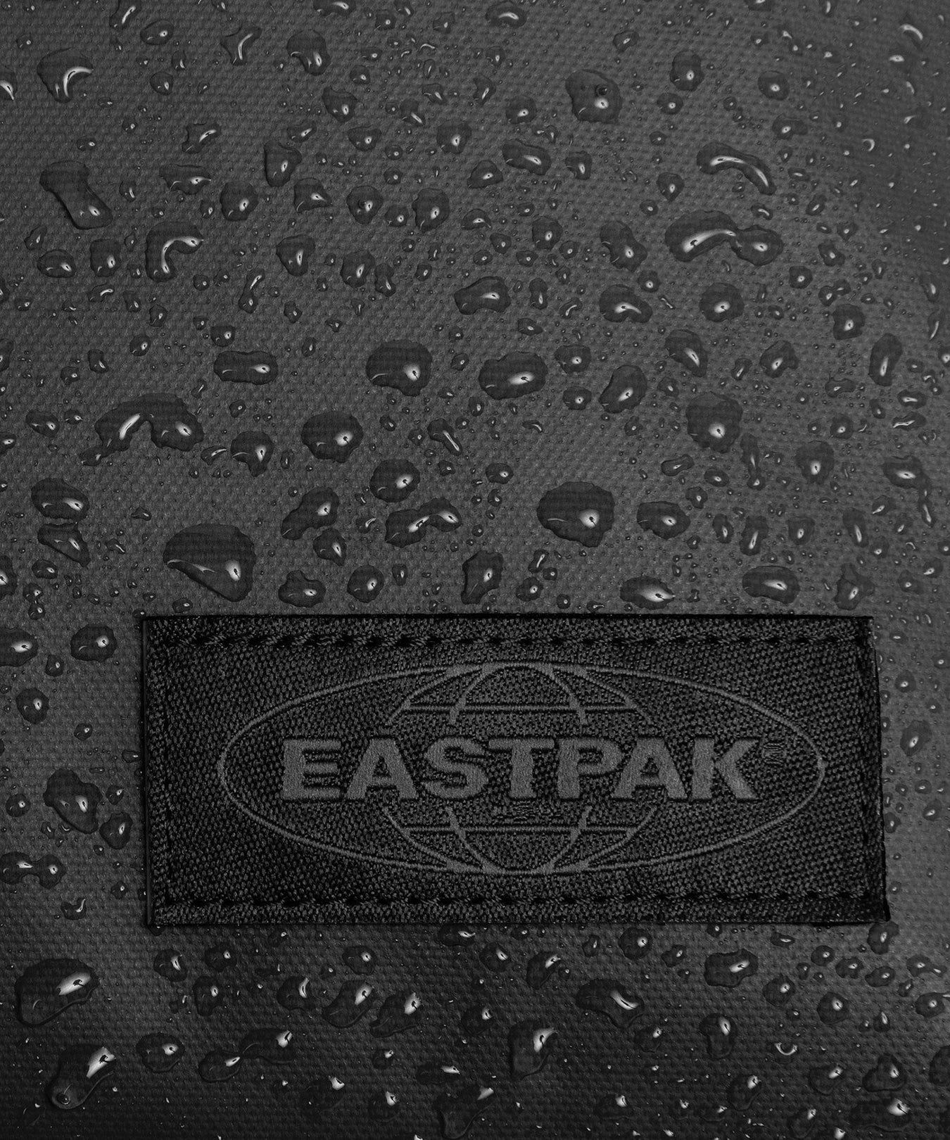 Eastpak Tarp Duffel Pack L Travel bag with wheels tarp black